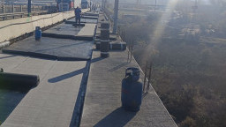 The waterproofing on the road slab of the Danube Bridge at Ruse is being applied