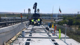 Corrosion protection is applied to the steel structure of the Danube Bridge at Ruse